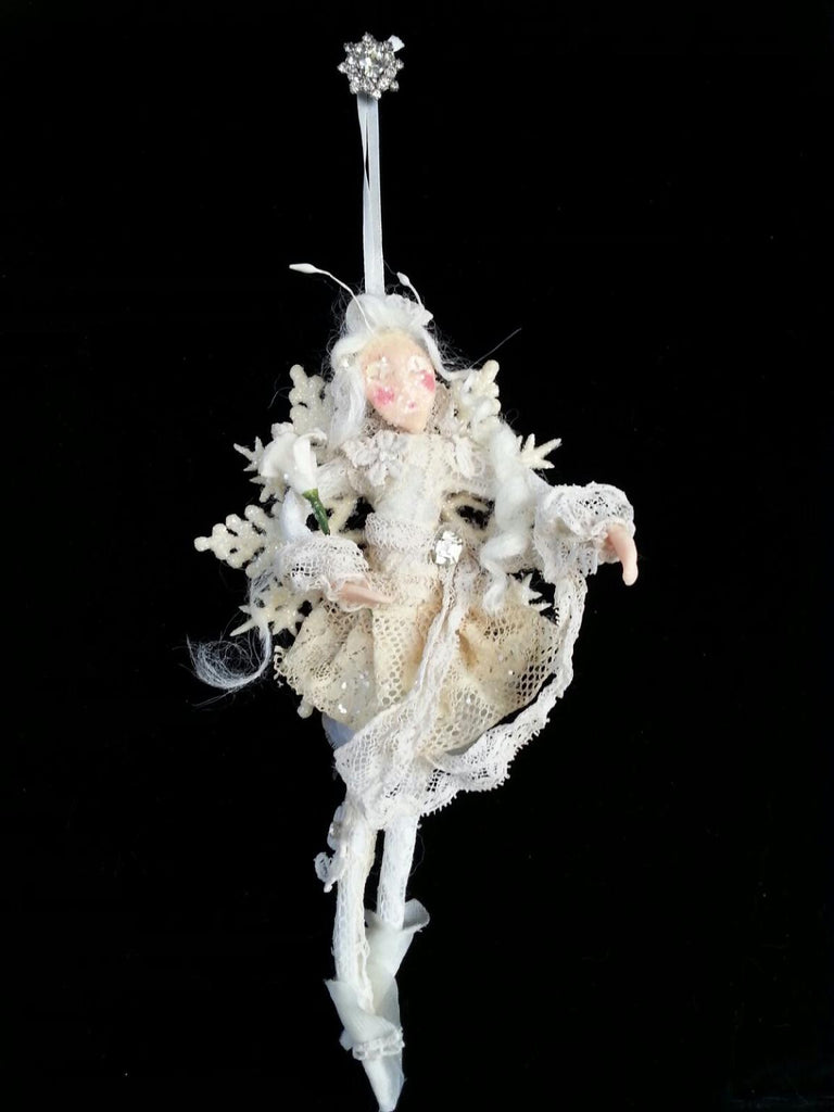 Fairy Holding White Flower